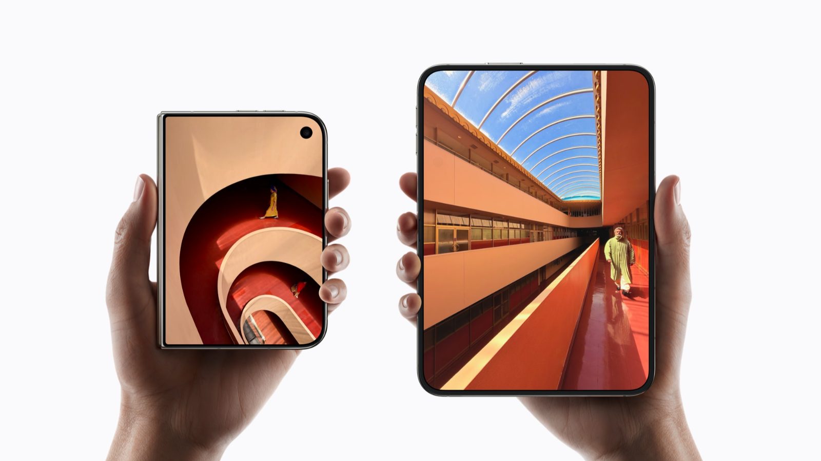 Two hands holding iPhone Duo devices, one folded and the other unfolded.